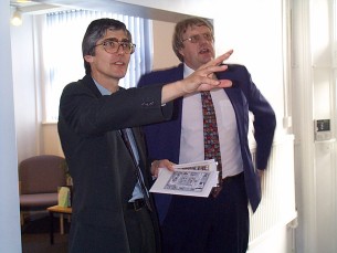 Gordon & John admire the works of art on display at the reception area.
