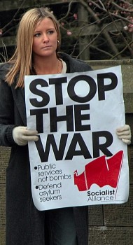Girl holding "Stop the War" banner outside Nelson & Colne College on 20 Mar 2003.